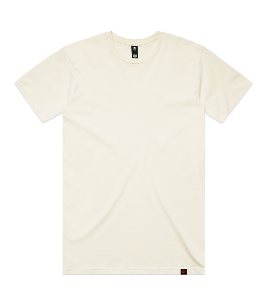 An off-white crewneck t-shirt laid flat against a solid white background, featuring a small black brand tag at the inner collar and a tiny red tag near the bottom hem.